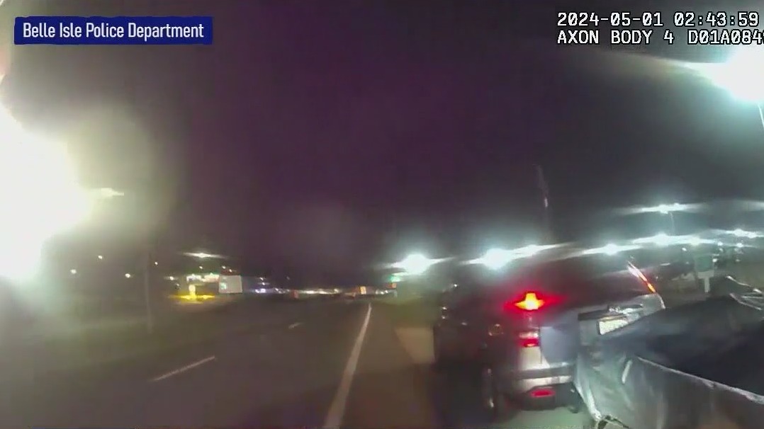Officer recounts moments being run over by trailer